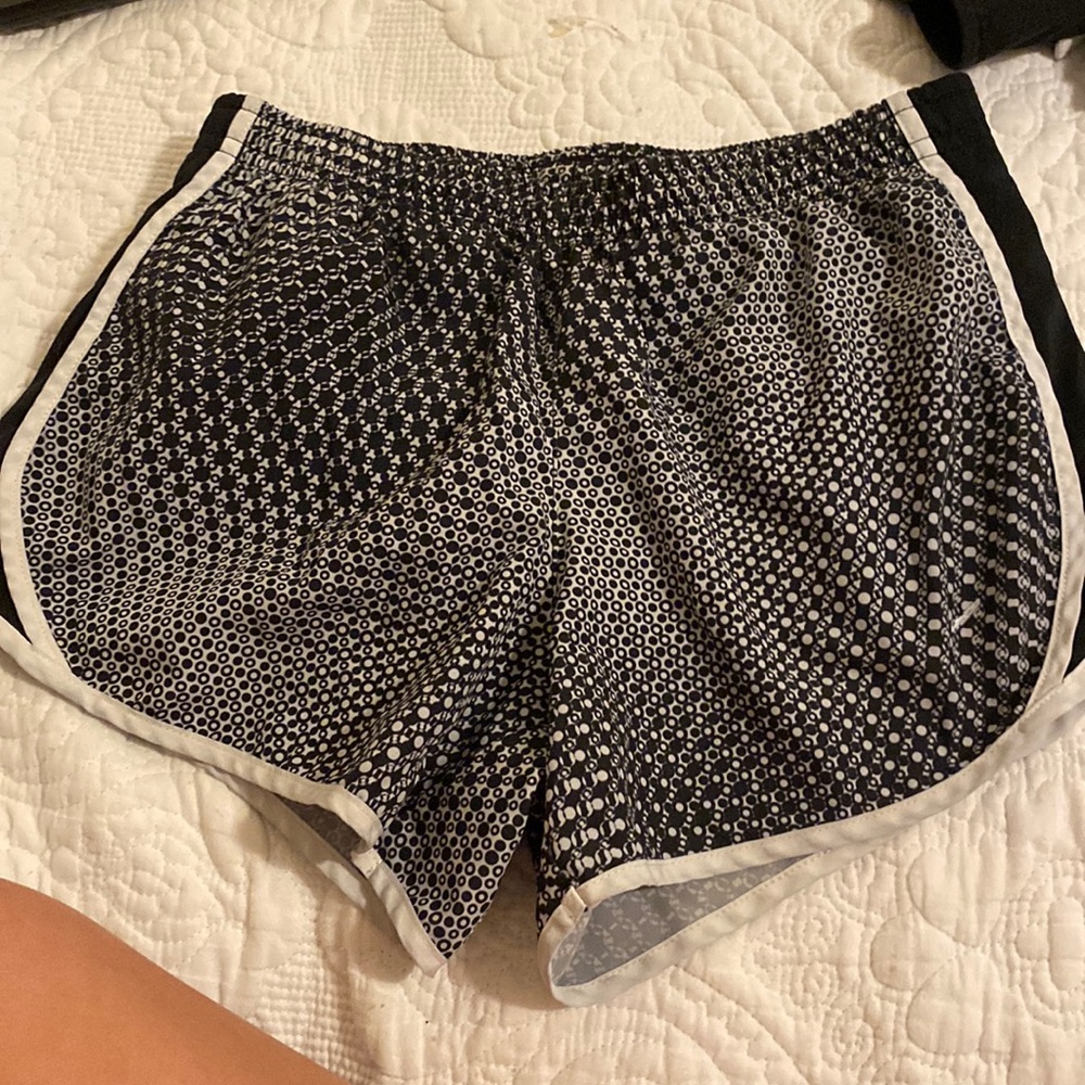 Girls running shorts!! Nike but the logo has faded!